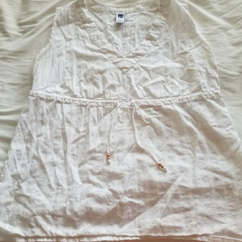 White sleeveless shirt